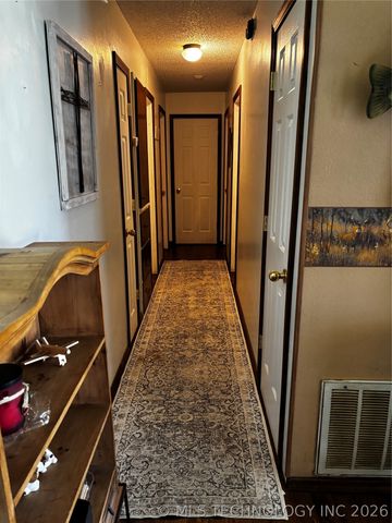 102 S Walnut, Hartshorne, OK 74547