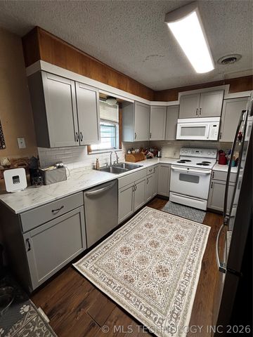 102 S Walnut, Hartshorne, OK 74547