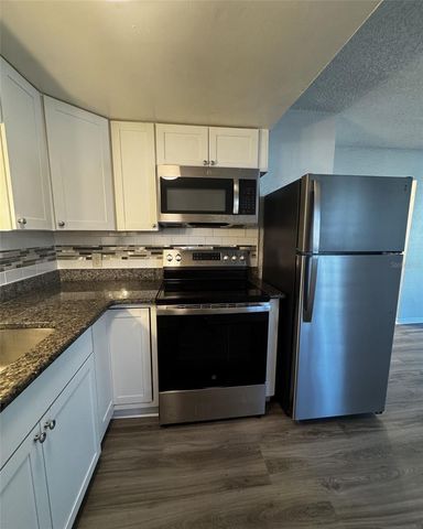 1142 SUNSET POINT ROAD 15, Clearwater, FL 33755