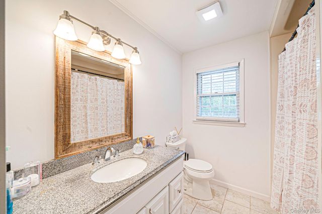 6 Rolling Woods Lane, Hampton Bays, NY 11946