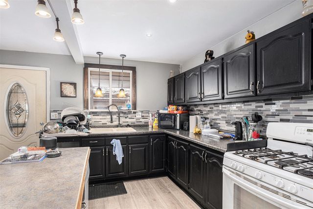 115 S Sherman Street, Sheridan, MI 48884