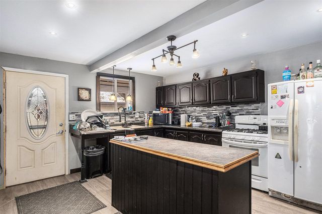 115 S Sherman Street, Sheridan, MI 48884