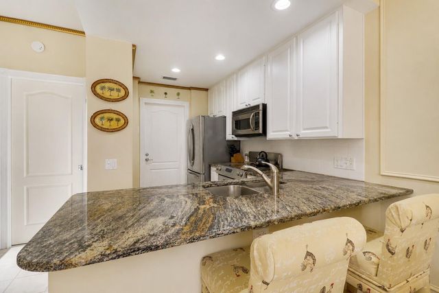 77 Laurel Oaks Circle, Tequesta, FL 33469