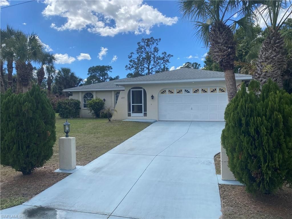 407 Plumosa AVE, LEHIGH ACRES, FL 33972 — exterior
