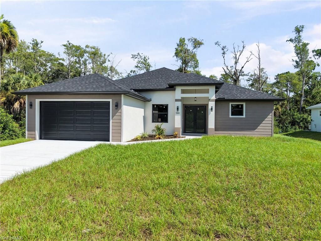 580 WOODVIEW DR, LEHIGH ACRES, FL 33972 — exterior