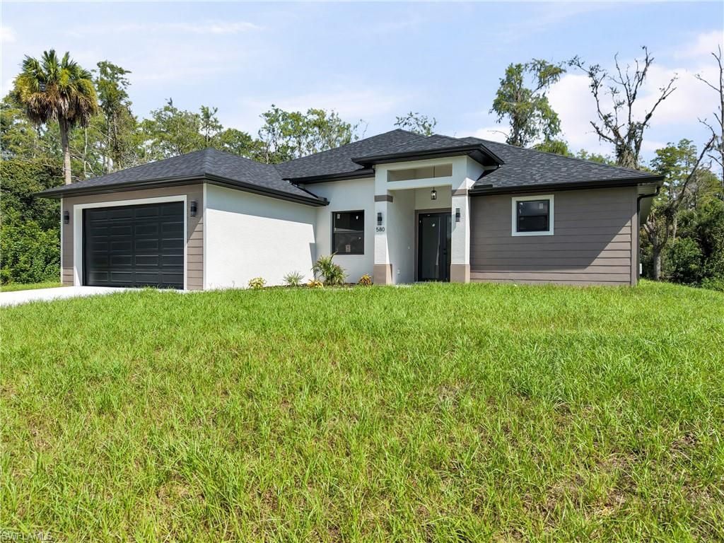 580 WOODVIEW DR, LEHIGH ACRES, FL 33972 — photo 2