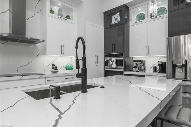 1347 23rd ST SW, Naples, FL 34117