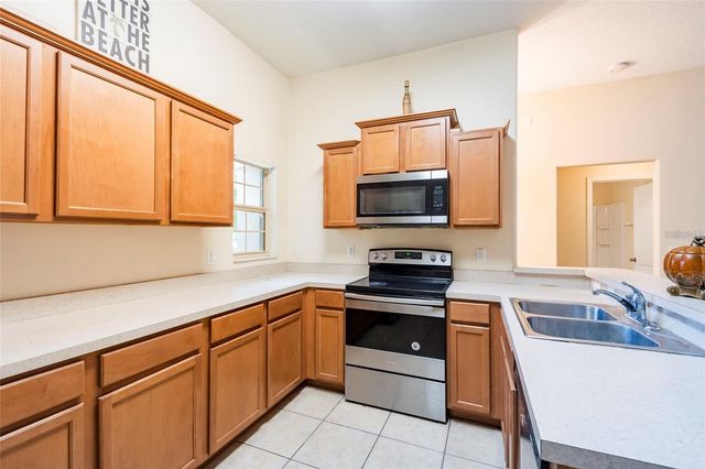 8117 ALAMOSA WOOD AVENUE, Ruskin, FL 33573