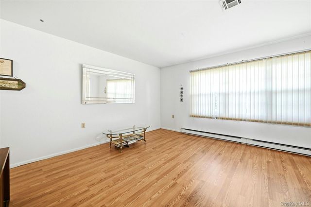 128D Exmore Court, Ridge, NY 11961