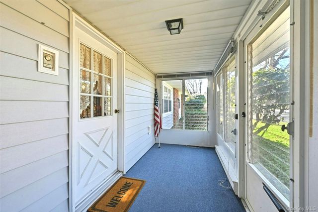 128D Exmore Court, Ridge, NY 11961