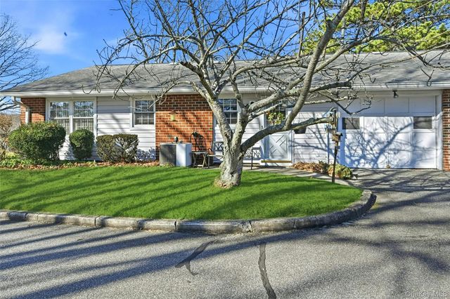 128D Exmore Court, Ridge, NY 11961