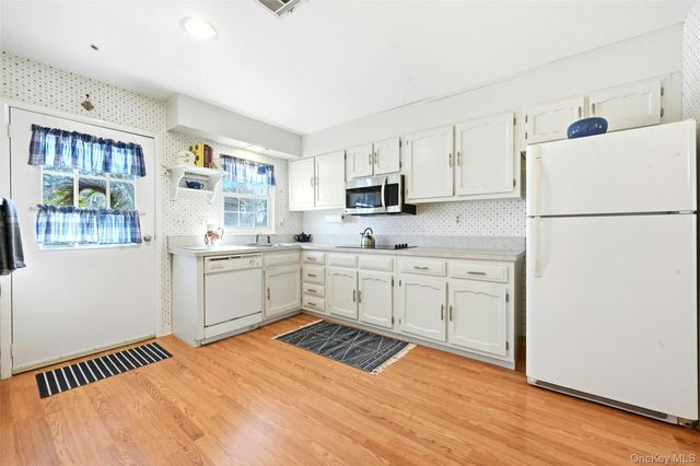 128D Exmore Court, Ridge, NY 11961