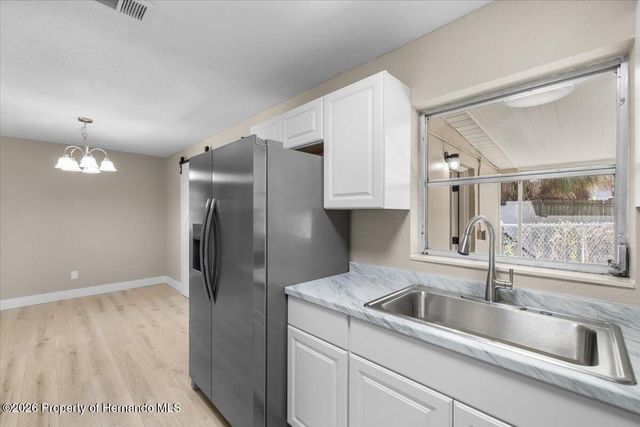 7338 Spring Hill Drive, Spring Hill, FL 34606