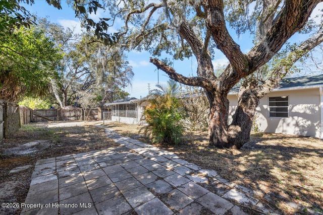 7338 Spring Hill Drive, Spring Hill, FL 34606