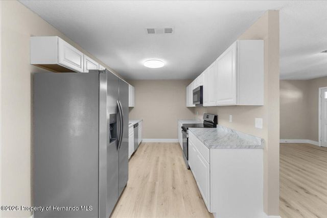 7338 Spring Hill Drive, Spring Hill, FL 34606