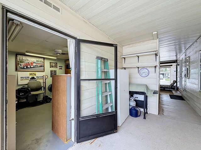 1690 NASSAU CIRCLE, Tavares, FL 32778