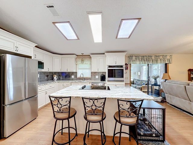 1690 NASSAU CIRCLE, Tavares, FL 32778