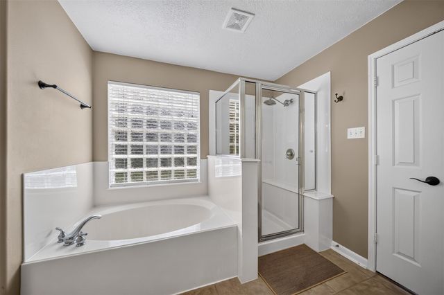 127 N Hawthorne Hollow Circle, The Woodlands, TX 77384