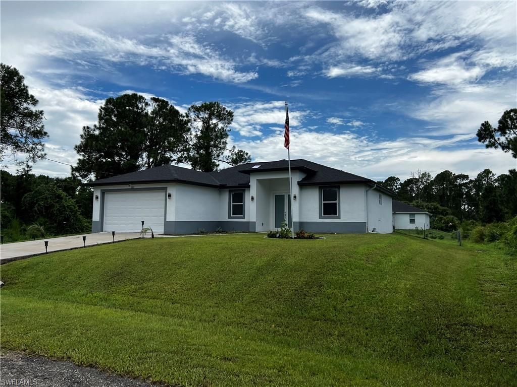 3313 68th ST W, LEHIGH ACRES, FL 33971 — exterior