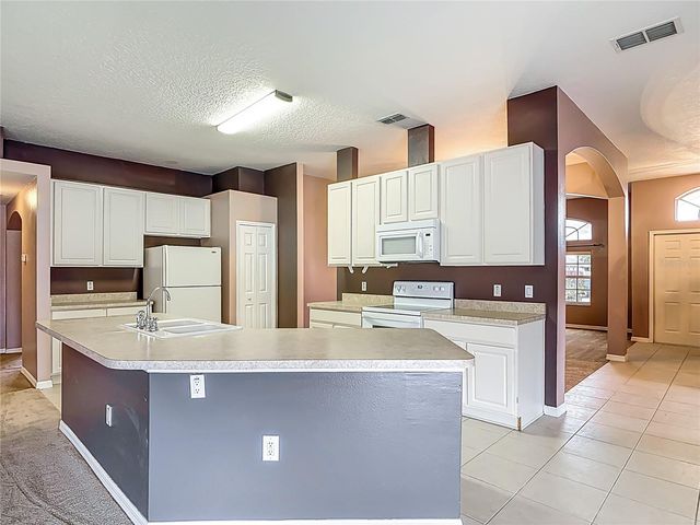 1296 SAXON BOULEVARD, Deltona, FL 32725