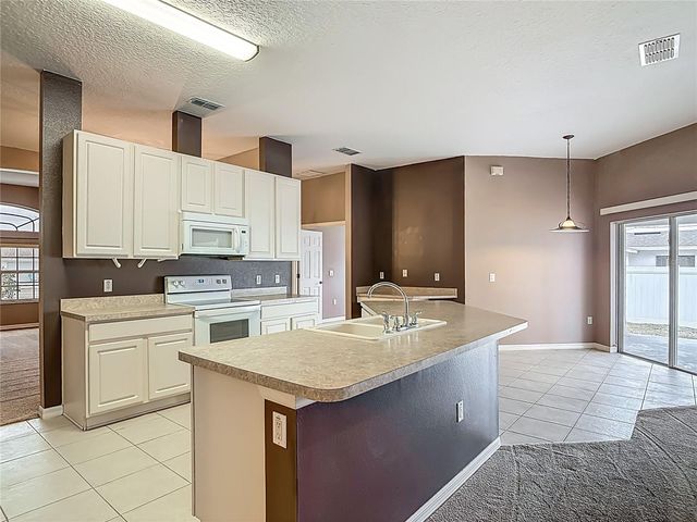 1296 SAXON BOULEVARD, Deltona, FL 32725