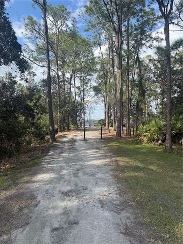 6911 BEARGRASS ROAD, Harmony, FL 34773
