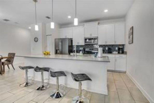 680 PEBBLE BEACH DRIVE, Davenport, FL 33896