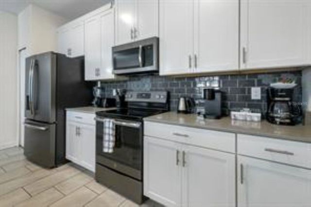 680 PEBBLE BEACH DRIVE, Davenport, FL 33896