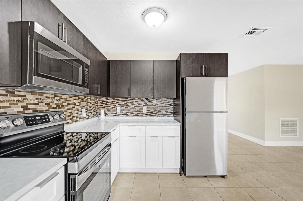 Image 21 of property listing at 1777 NW 34th Ave, Lauderhill, FL 33311