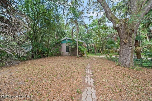 5747 Cajeput Circle, Melbourne Village, FL 32904