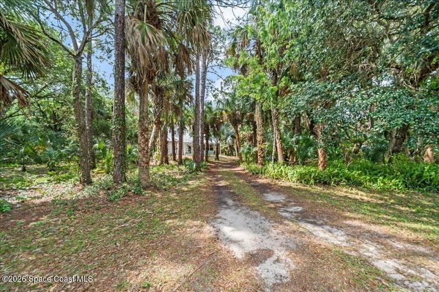 5747 Cajeput Circle, Melbourne Village, FL 32904