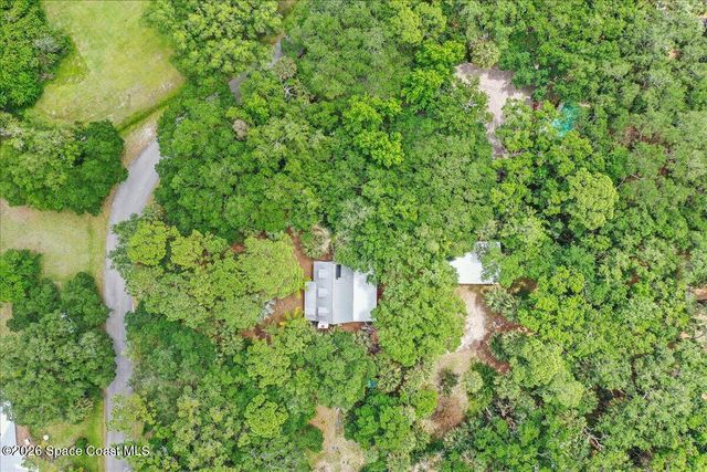 5747 Cajeput Circle, Melbourne Village, FL 32904