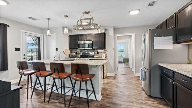 7460 Commander Roland Drive, Hitchcock, TX 77563