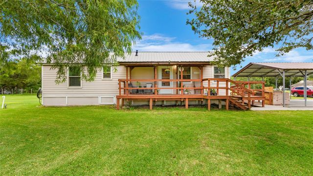 7460 Commander Roland Drive, Hitchcock, TX 77563