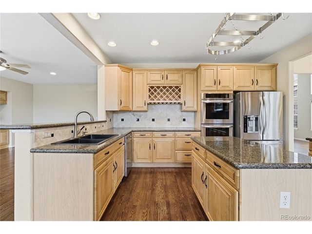 7148 S Quemoy St, Aurora, CO 80016