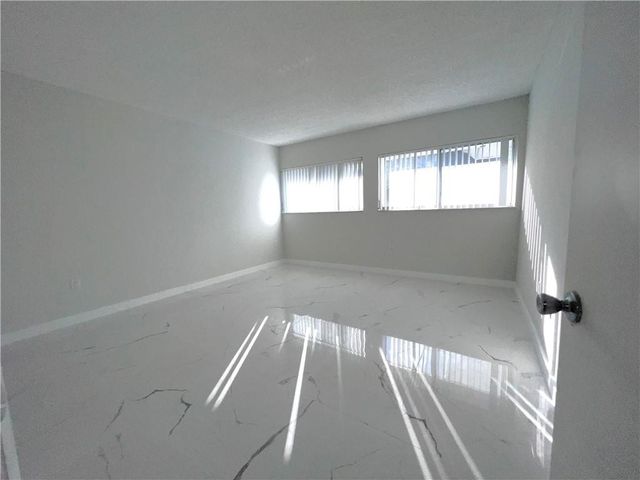 701 N Pine Island Road 303, Plantation, FL 33324