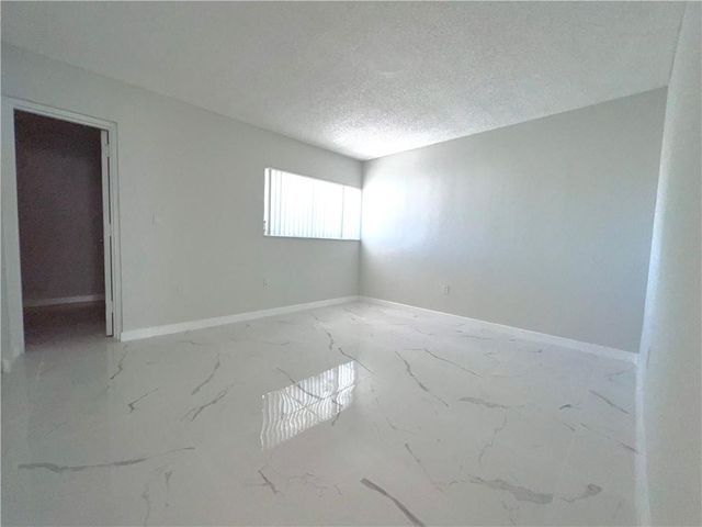 701 N Pine Island Road 303, Plantation, FL 33324