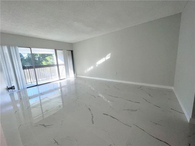 701 N Pine Island Road 303, Plantation, FL 33324