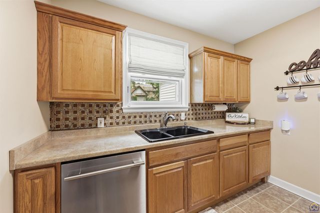 1215 SW Collins AVE, Topeka, KS 66604