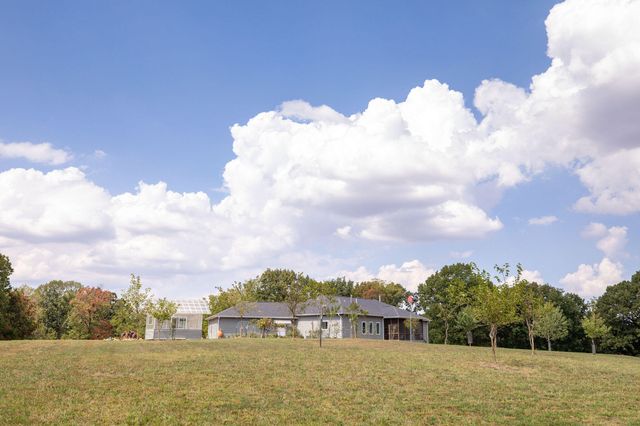 1125 Honeysuckle Street, Lowell, AR 72745