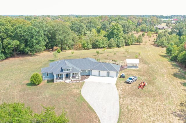 1125 Honeysuckle Street, Lowell, AR 72745