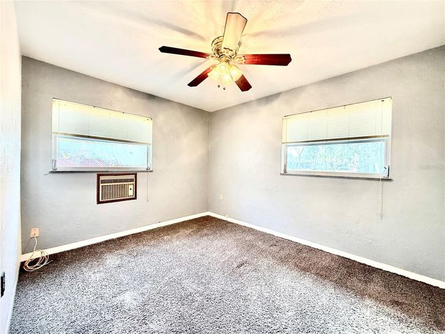 10862 VILLAGE GREEN AVENUE, Seminole, FL 33772