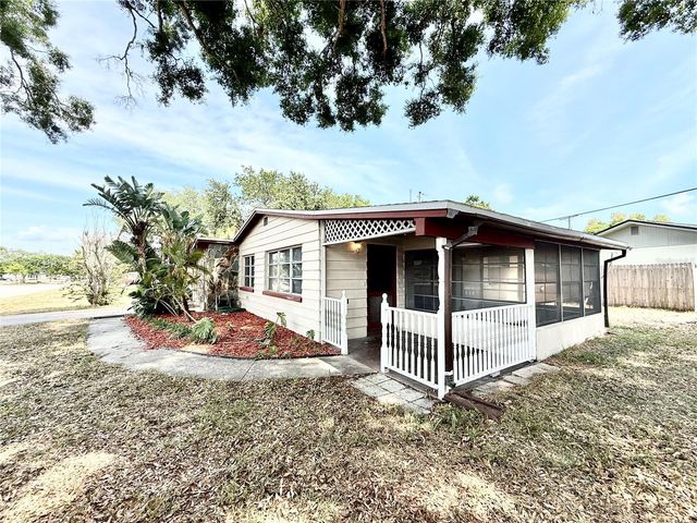 10862 VILLAGE GREEN AVENUE, Seminole, FL 33772