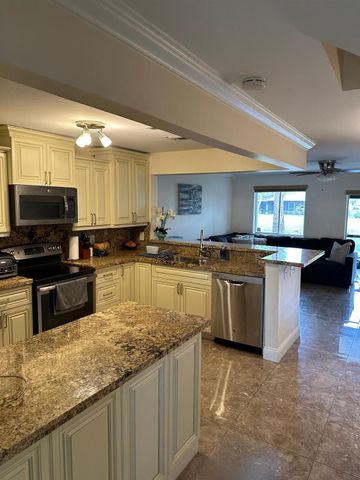 1975 Discovery Circle, Deerfield Beach, FL 33442