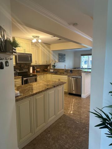 1975 Discovery Circle, Deerfield Beach, FL 33442