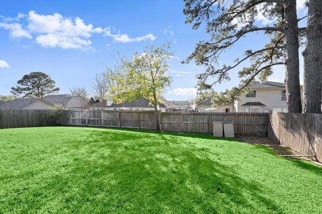 9871 Twin Shores Drive, Willis, TX 77318