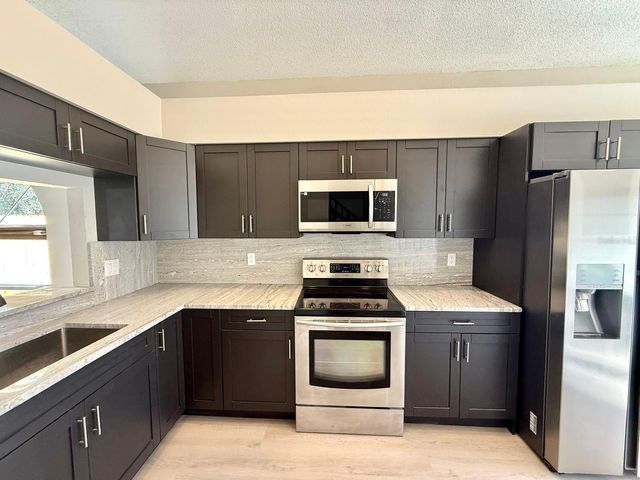 8731 HUNTFIELD STREET, Tampa, FL 33635