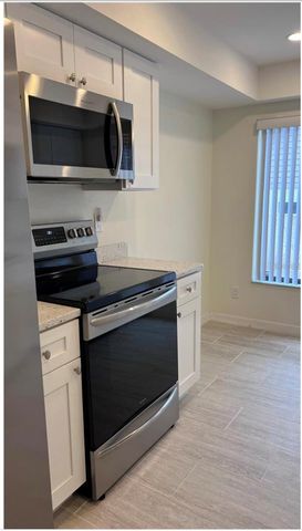 1890 WHISPERING WAY 1890, Tarpon Springs, FL 34689