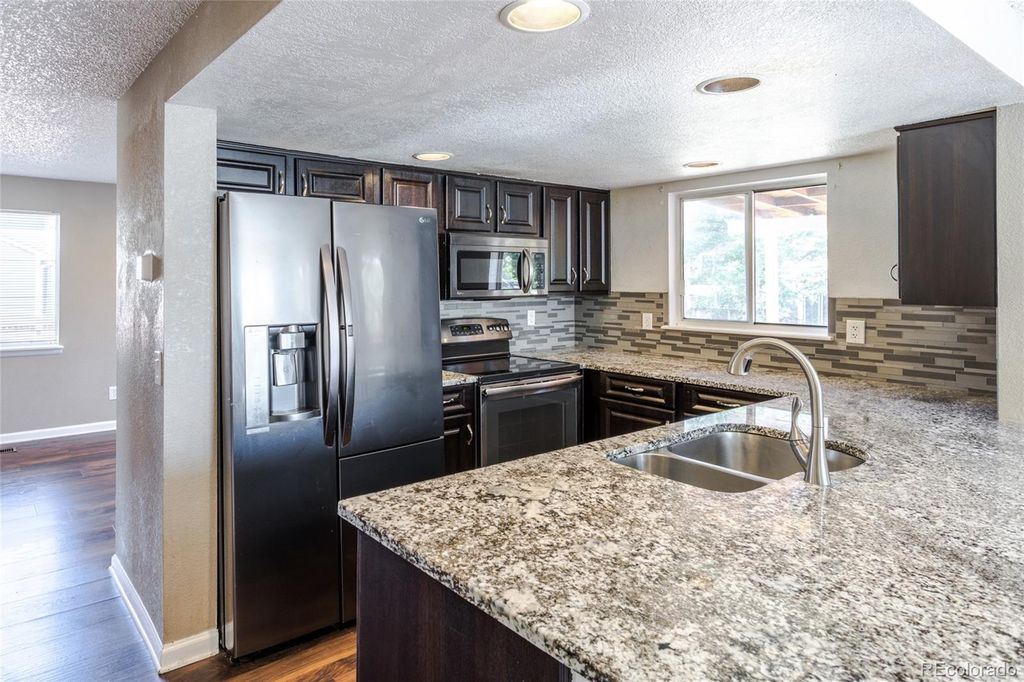Image 5 of property listing at 4984 S Dunkirk Way, Centennial, CO 80015