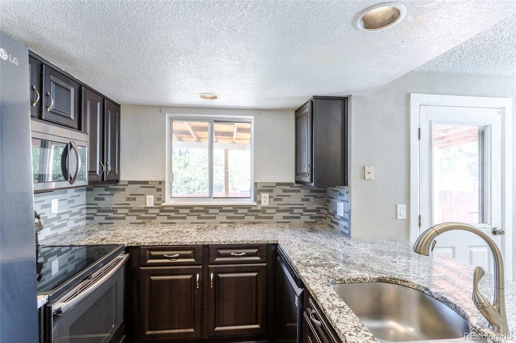 Image 6 of property listing at 4984 S Dunkirk Way, Centennial, CO 80015